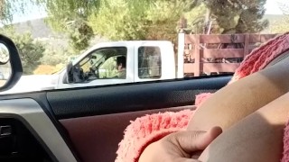 Flashing big tits in public