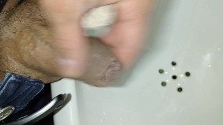 Desperate pissing in a public bathroom, they almost caught me close-up, submissive gay