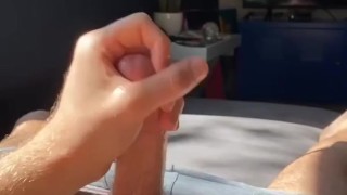 Lubing up my cock and fucking my pocket pussy while enjoying the sunshine ending with a nice load 😈