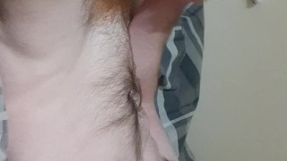 Teen wanks in bed watching porn and feeling dick over boxers