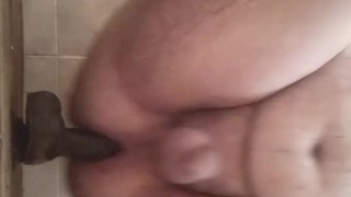 Chubby boy rides his bbc dildo in bathroom 