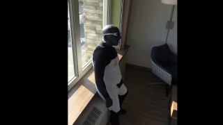 cumming inside wetsuit watching construction workers outside hotel