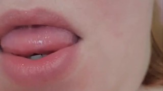 The fat woman plays with her tongue and shows her bush between her legs