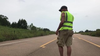 Construction worker in middle of road naked and jacking off. Eats own cum.