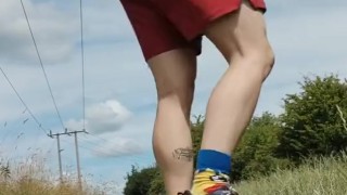 Stripping naked in a field