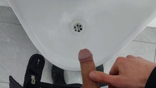 Young twink cruising up public male restroom at a local mall, hoping to catch some curious dicks