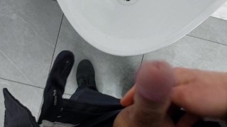 Young twink cruising up public male restroom at a local mall, hoping to catch some curious dicks