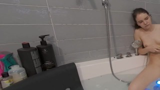 Solo brunette Cinderella plays with a dildo in the bathroom in 4K.