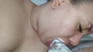 big lips going to the bottom of the excited cock, sucking it until it spurts sperm
