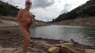 Guy swims with anal plug in lake