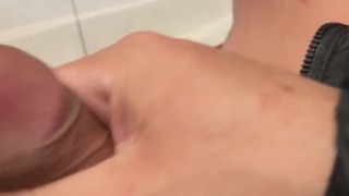 playing with my dick in a busy public bathroom