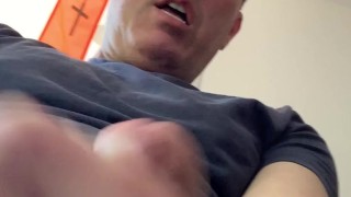 Jerking-off and cumming, close-up POV. View from under my balls, looking up. I eat my cum and smile!