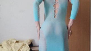 Skinny femboy tries out kinky feminine clothes on camera with erotic music playing in the background