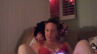 Girl takes off her minidress and then tease with her bra and panties and shows off her feet