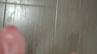 Risky jerk off walking around the hostel shower room trying to get caught