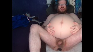 massively pregnant and pushing out a huge inflated plug with painful contractions