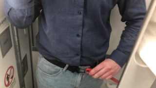 Big dick jerked off in airplane toilet