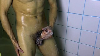 hot stud washes his hot body after workout