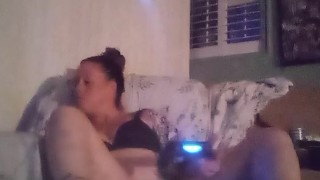 Gamer Girl In Black Bra and Panties Playing Video Games