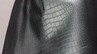 Femboy tries on women's blouse and skirt in store fitting room