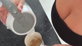 Big Boobs Baby drinks coffee
