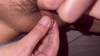 Close-up. How a woman caresses her clitoris.