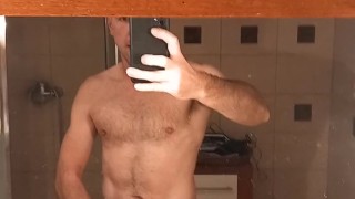 Muscular hairy guy getting horny before shower - Big dick