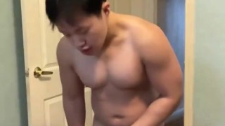 Horny Asian Guy Strokes His Cock