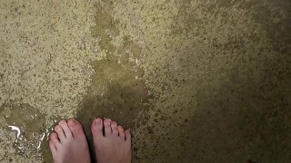 Messy long feet pee outdoors