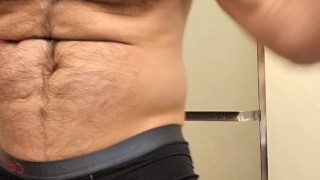 HAIRY MUSCLE BEAR FLEXING