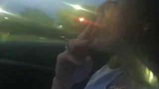 Milf smoking cigarettes while in passenger seat in vehicle