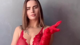 Brunette with big breasts in red lingerie showcases her body