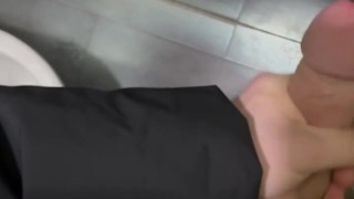 young twink jerking his big dick in public toilet