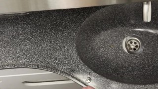 young twink jerks off his cock in a train toilet