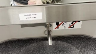 young twink jerks off his cock in a train toilet