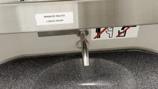 young twink jerks off his cock in a train toilet