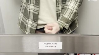 young twink jerking off his cock in train toilet