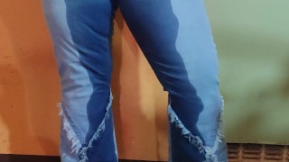 Desperate chubby MILF pees in blue jeans