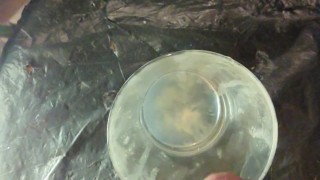 Cumming in a glass of cum