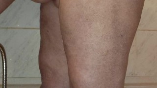 Chubby BBW shaves her hairy pussy and washes herself in the shower