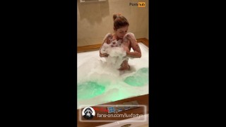 This beautiful ex-youtuber hot milf showcases sensual erotica in the bath.