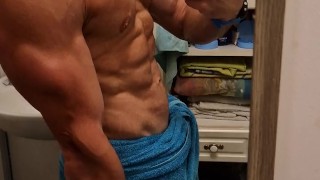 Very hot boy enjoys the power of the shower