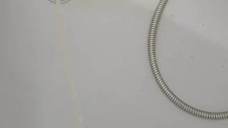 pissing in the tub