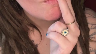 Smoking Brunette Plays With Her Titties