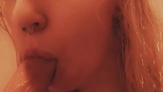 Kitten sucks and licks her cum of her dildo after cumming in the shower