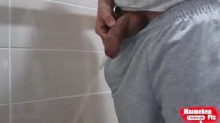 Guy long pissing with uncircumcised cock and big balls