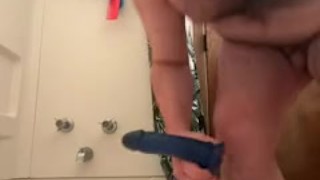 chubby bear riding a dildo in the bathroom