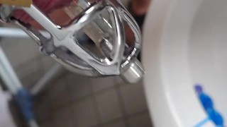 Piss in the penis cage with catheter in tights