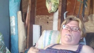 Smoker shows off boobs