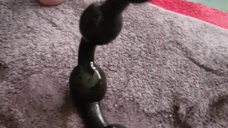 Pulling 4-ball toy out